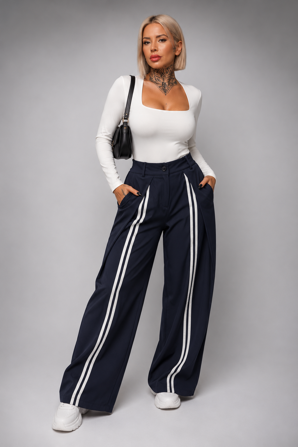Pantalón de pinzas con rayas laterales