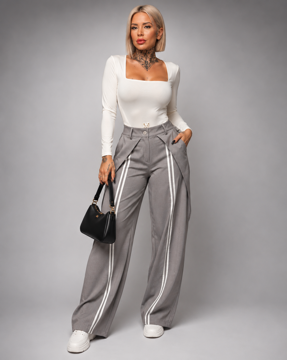 Pantalón de pinzas con rayas laterales
